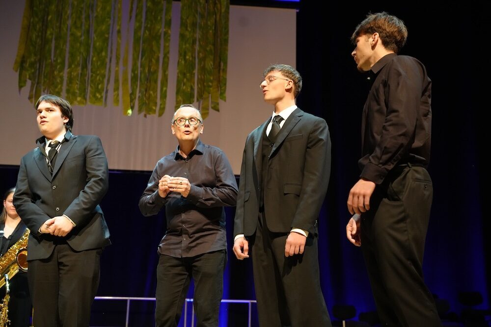 Männerstimmen des Vokalensembles auf der Bühne, Best of Schulwerk 2026